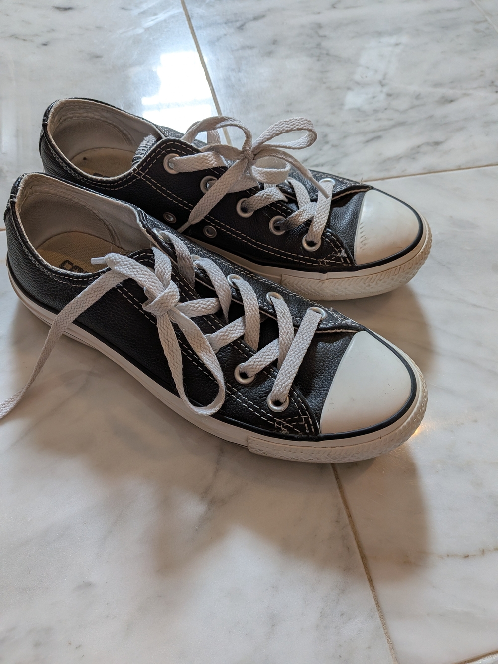 Leather Converse Chuck Taylor Low-Top Sneakers in Black and White